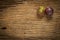 red grapes. slice. half. on wooden table