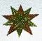 Red and green abstract extruded christmas stars