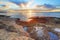 Red and green algae covered rocks at sunrise Coogee, Sydney Aus