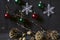 Red and green balls,snowflakes with dry twigs,pine cones,nuts