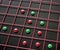 Red, green candies in a grid