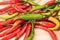 Red green chile pepper spicy thin pod close-up vegetable background
