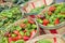 Red and Green Chili in bushel baskets for sale