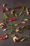 Red and green chilly pepper,herbs and spices on a gray background