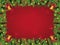 Red and green Christmas background - decorated pine tree branches rectangle frame