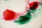 Red and Green Christmas Color Splatter Abstract background