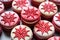 red and green macarons arranged in a snowflake pattern