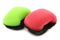 Red and green plastic and foam abrasive pads