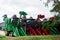 Red and green sugarcane harvester.