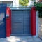 Red and grey modern house entrance external door, Athens Greece