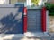 Red and grey modern house entrance external door, Athens Greece