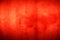 Red grunge uneven noise background texture