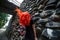 Red hair fluttering. Dark stone wall. Creepy horror image