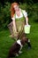 Red hair girl in pin-up style bavarian style outdoor