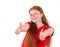 Red hair teenager girl in a red shirt showing a thumbs-up on both hands