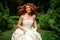 red-haired bride surrounded by nature