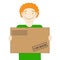 The red-haired cute courier is holding a parcel in his hands. Delivery