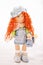 Red-haired doll handmade dressed in jeans