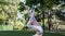 A Red-Haired Fair-Skinned Woman Practicing Yoga and Meditation in the Forest