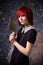 Red-haired girl with an ax