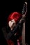 red haired girl with guitar