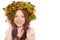 Red haired happy woman with flower wreath on head