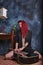 Red haired lady with acoustic guitar