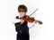 Red-haired preschooler boy with violin