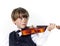 Red-haired preschooler boy with violin