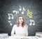 Red haired student at a table, music notes