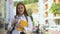 Red-haired young female with rucksack holding books, students life, education