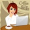 Red haired young hipster woman with laptop enjoying a hot coffee in coffee shop