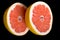 Red halved grapefruit