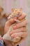 Red hamster domestic rodent pet close-up in hand