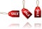 Red hanging tags with the word sale