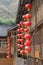 Red happy lanterns at ancient wooden houses, Dazhai / Longsheng, China