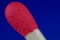 red head of flammable material of phosphorus stick with blue background