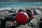 Red headphones on the black sand, ocean views