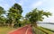 Red health walkway and bicycle path by the Yongjiang river, adobe rgb