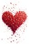 Red heart arranged with confetti on a white isolated background. New Year\\\'s fun and festivities