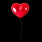 Red heart balloon isolated on black background. Party decorations.