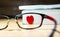Red heart behind glasses