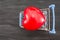 Red heart in a blue cart on a black background. View from above.