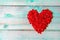 red heart on a blue wooden background