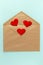 Red heart on brown envelope. Love letter for valentine`s day.