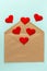 Red heart on brown envelope. Love letter for valentine`s day.