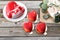 Red heart cacke desserts and buttercups on wooden background. dessert for breakfast on Valentine`s Day