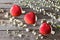 Red heart cacke desserts and sakura on wooden background. dessert for breakfast on Valentine`s Day