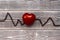 Red heart, cardiogram of coffee beans.