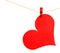 Red Heart with Clothespin hanging on clothesline isolated